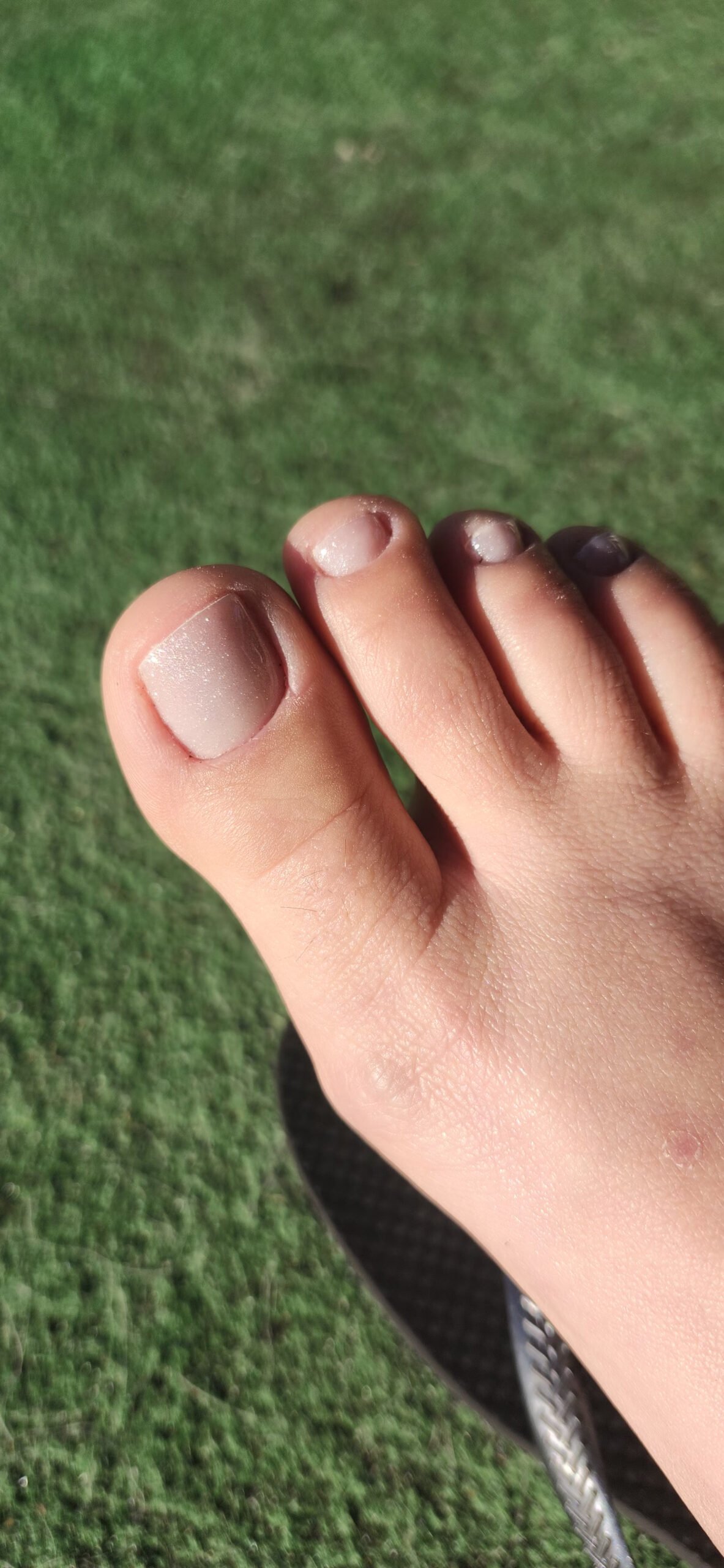 Glossy gel pedicure with a high-shine finish by Nails by Odett in Naples, FL